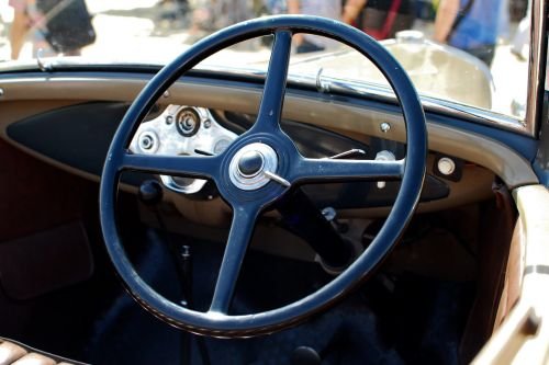 Por Que  Volante à Direita